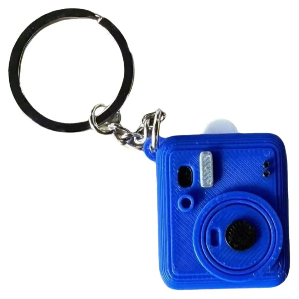 MiniMemory™ – Pull-Out Photo Camera Keychain