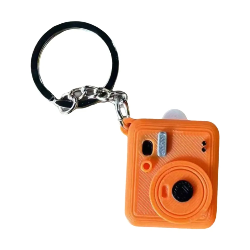 MiniMemory™ – Pull-Out Photo Camera Keychain